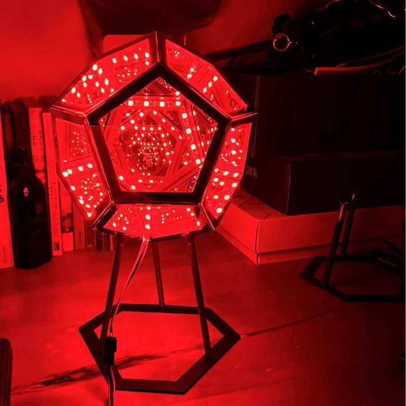 3D infinity mirror dodecahedron night light with rainbow LED glow on a wall, creating a photo backdrop for parties