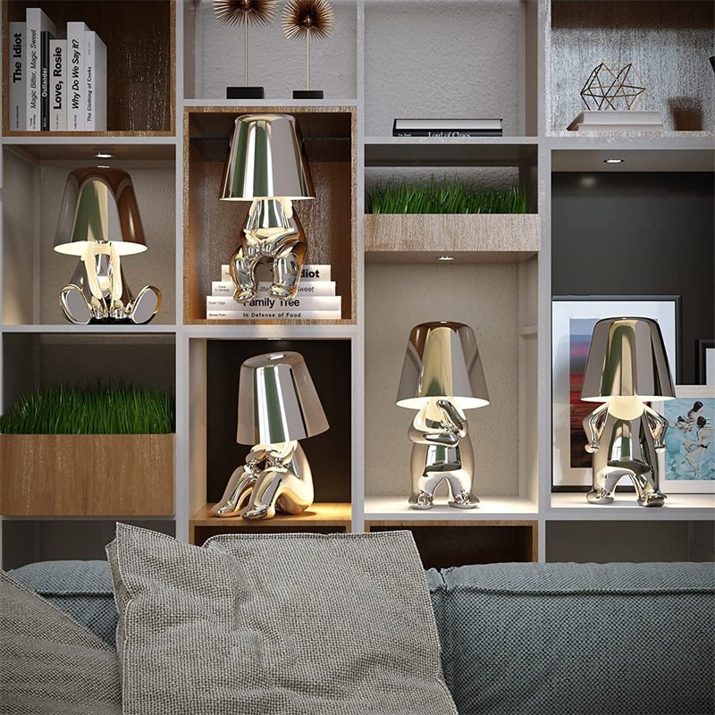 Cordless Thinker sculpture table lamp with frosted glass shade for modern decor