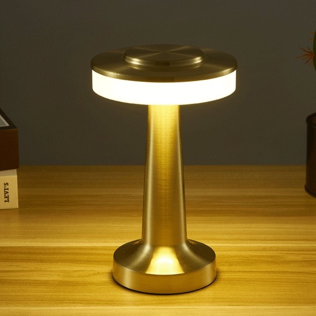 Cordless LED table lamp with touch dimmer on a nightstand in a nursery