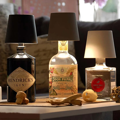 Rechargeable wine bottle light with color-changing LED on a black bottle for home entertaining
