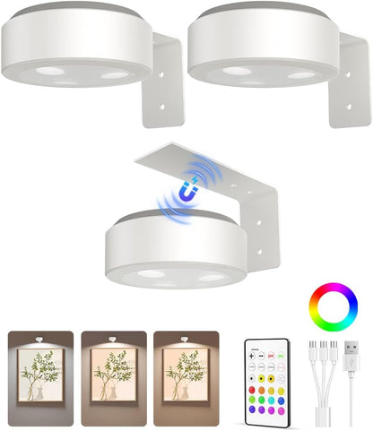 Wireless rechargeable picture light illuminating a framed photo on a wall