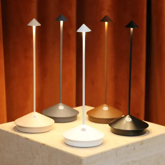Cordless LED table lamp on a patio table for outdoor ambiance