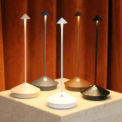 Cordless LED table lamp on a patio table for outdoor ambiance
