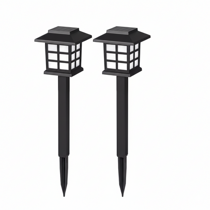 Solar pathway light on a garden walkway at dusk, no wiring needed