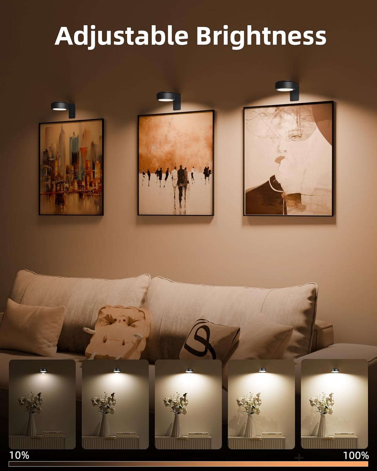 Wireless rechargeable picture light illuminating a framed photo on a wall