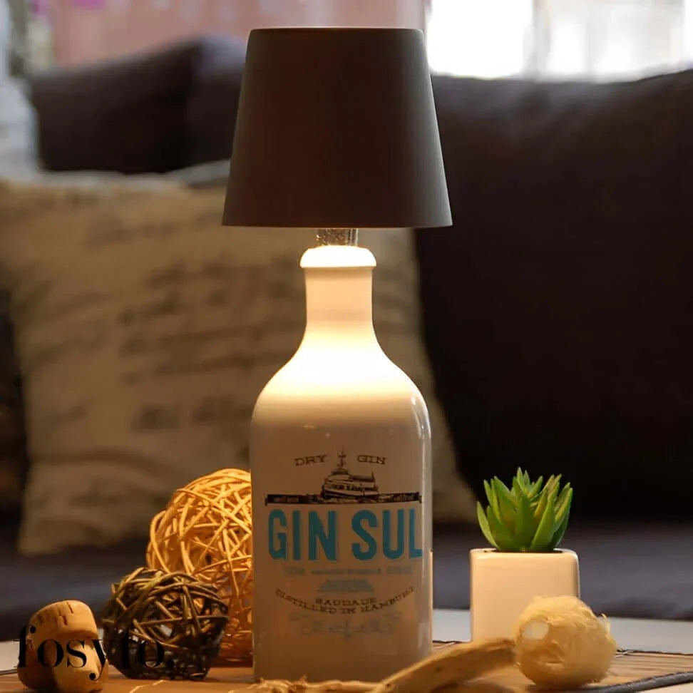 Rechargeable wine bottle light with color-changing LED on a black bottle for home entertaining