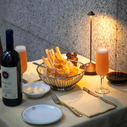 Cordless LED table lamp on a patio table for outdoor ambiance