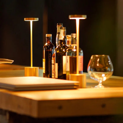 Cordless table lamp with warm light on an outdoor dining table