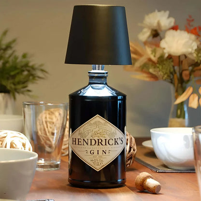 Rechargeable wine bottle light with color-changing LED on a black bottle for home entertaining