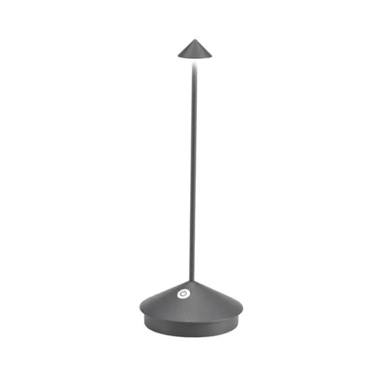 Cordless LED table lamp on a patio table for outdoor ambiance