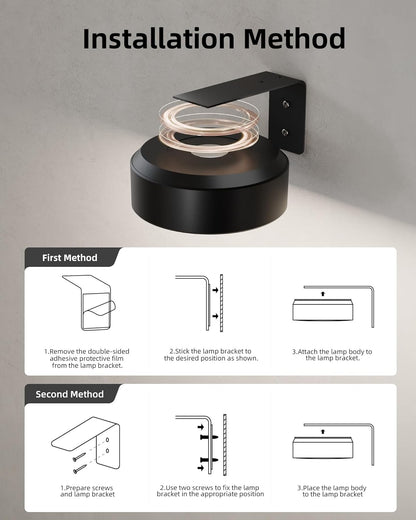 Wireless rechargeable picture light illuminating a framed photo on a wall