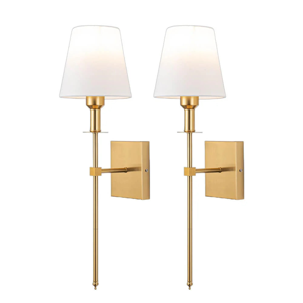 Rechargeable wireless wall light with metal accents, mounted on a wall in a living room, for renters