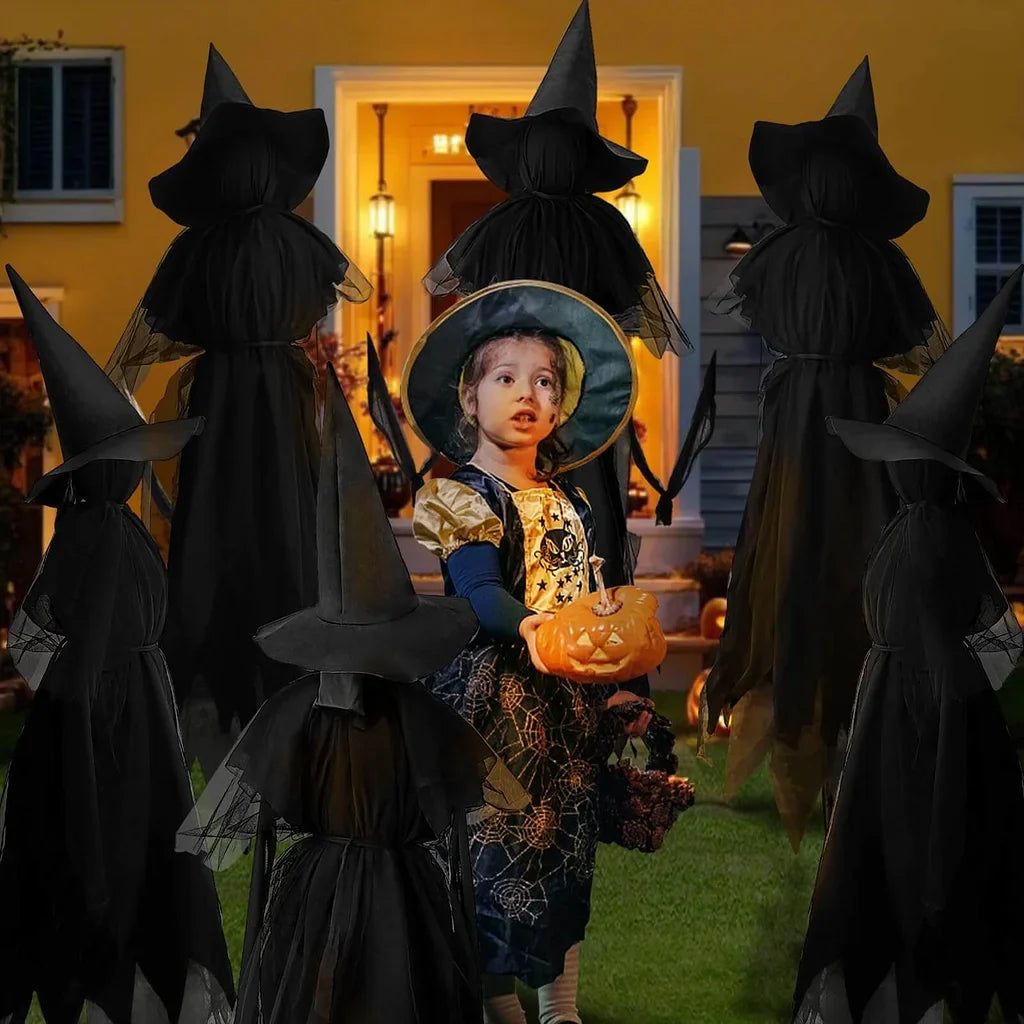 Life-size sound-activated screaming Halloween witches with glowing LED faces for yard display