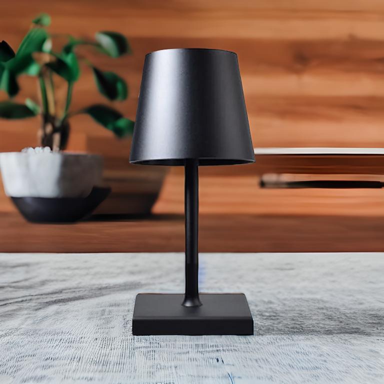 Cordless table lamp with aluminum body and touch controls, suitable for outdoor and bathroom use