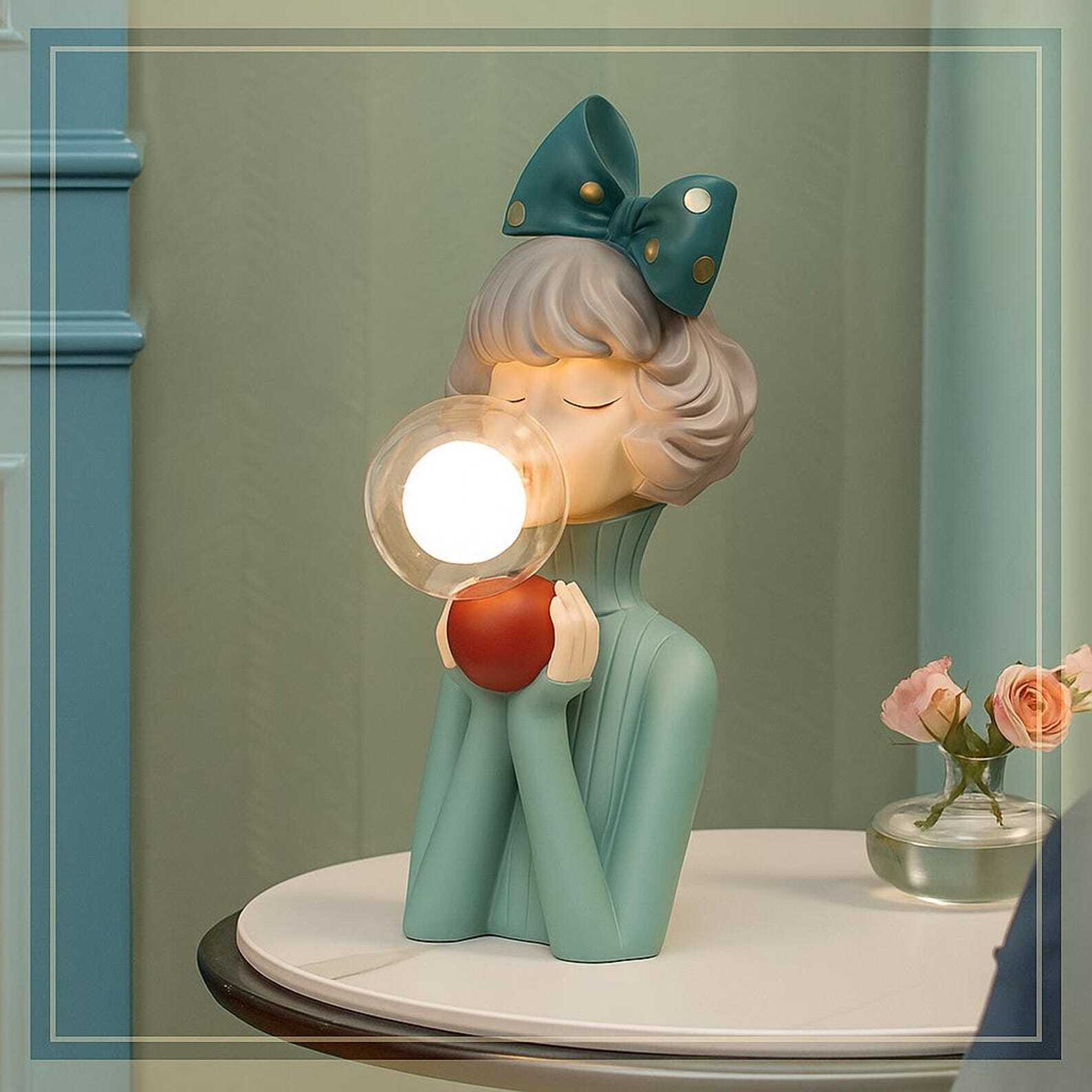Handcrafted resin cordless table lamp with glass globe for design-conscious decorators