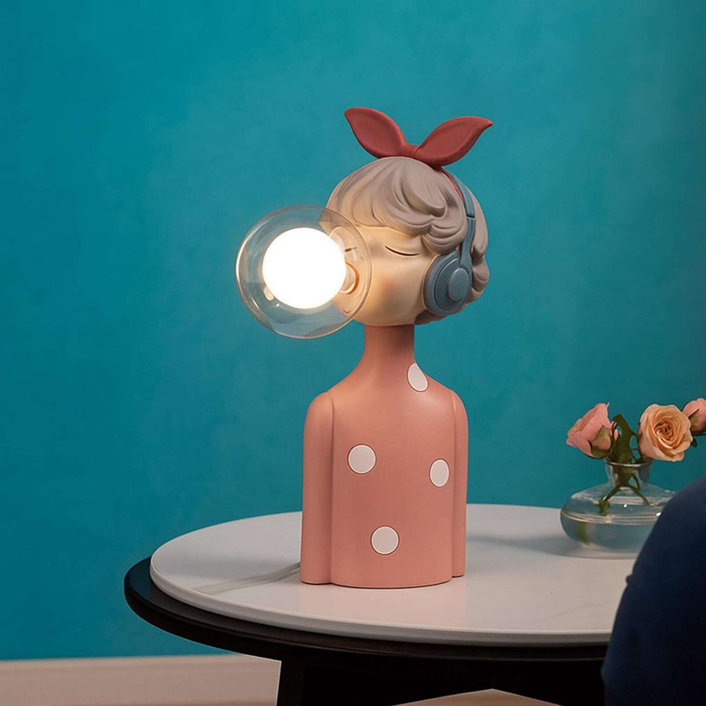 Handcrafted resin cordless table lamp with glass globe for design-conscious decorators
