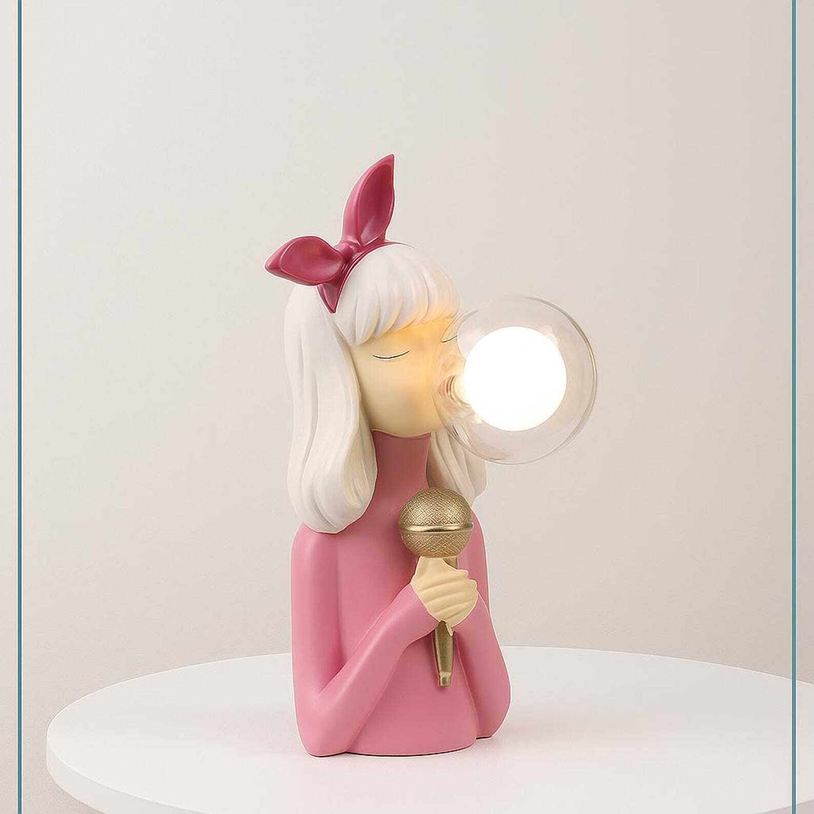 Handcrafted resin cordless table lamp with glass globe for design-conscious decorators