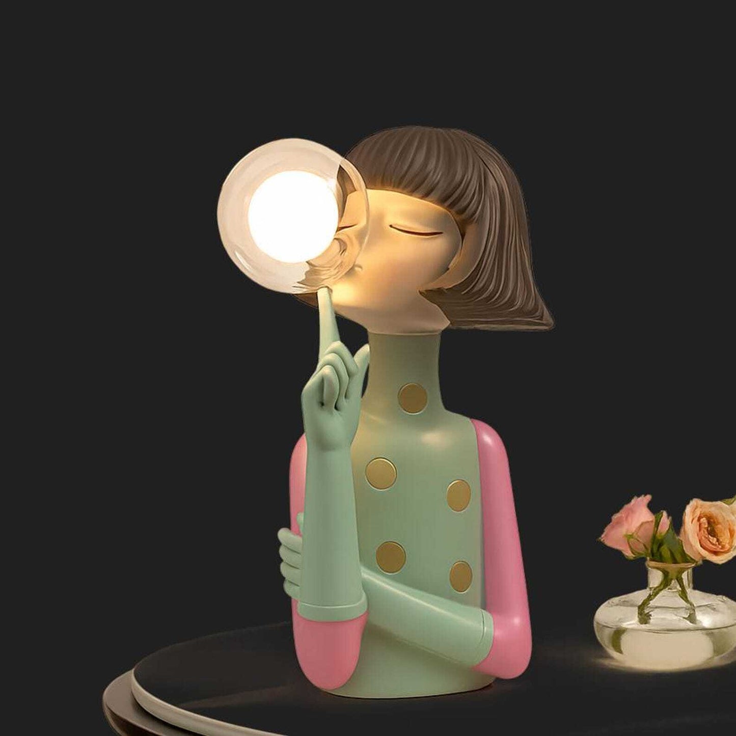 Handcrafted resin cordless table lamp with glass globe for design-conscious decorators