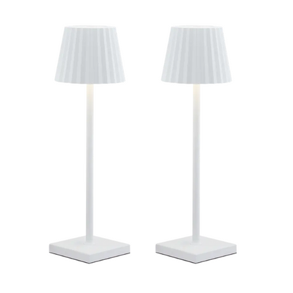 Cordless waterproof LED table lamp on a patio table for outdoor entertaining