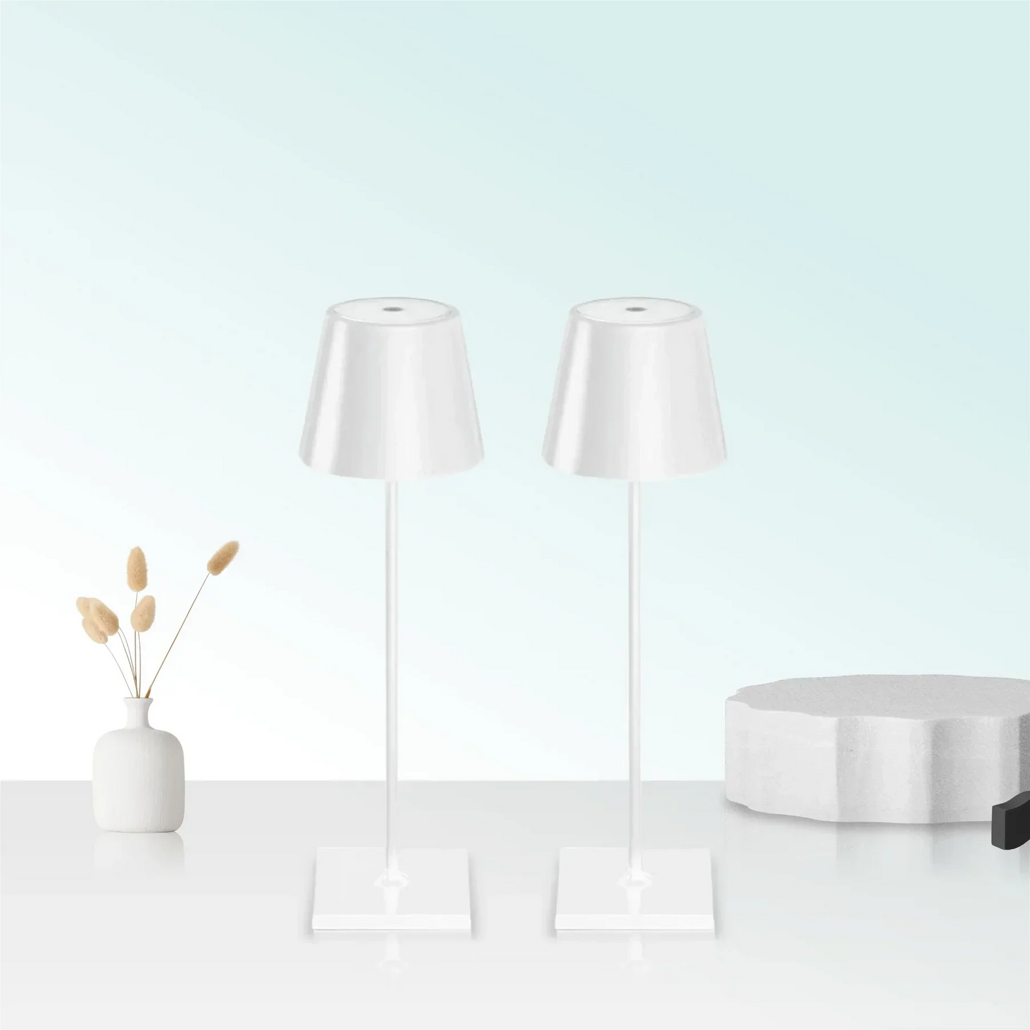 Cordless waterproof table lamp on an outdoor dining table for patio use