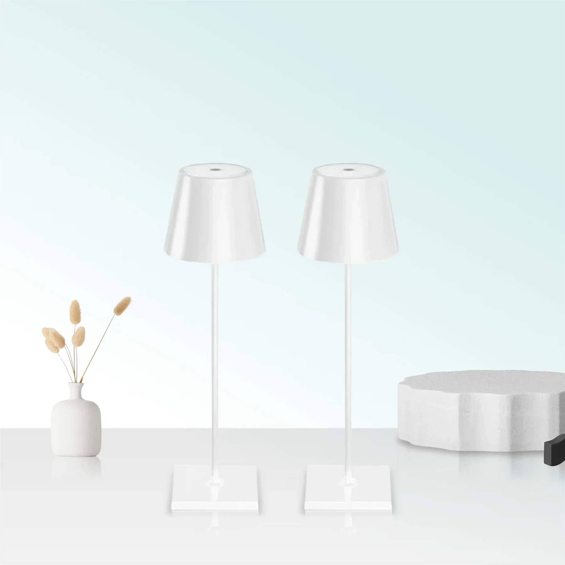Cordless waterproof table lamp on an outdoor dining table for patio use