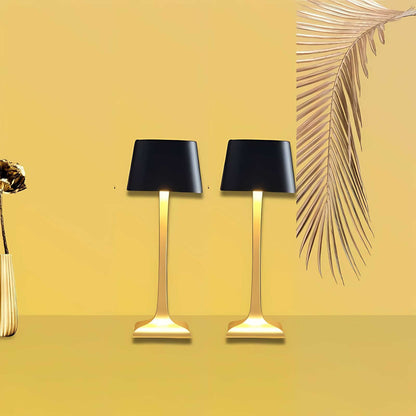 Cordless table lamp with touch controls on a bedside table, portable for any room