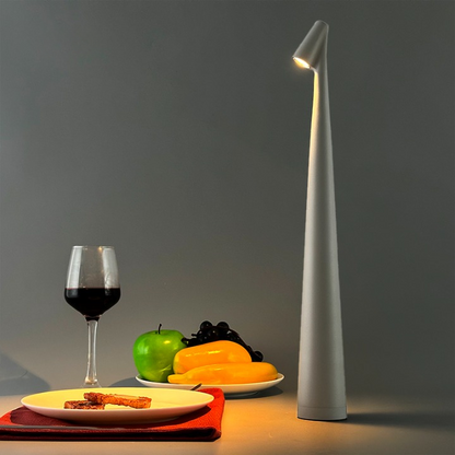 Cordless touch lamp with aluminum body and downward shade, perfect for apartment dwellers