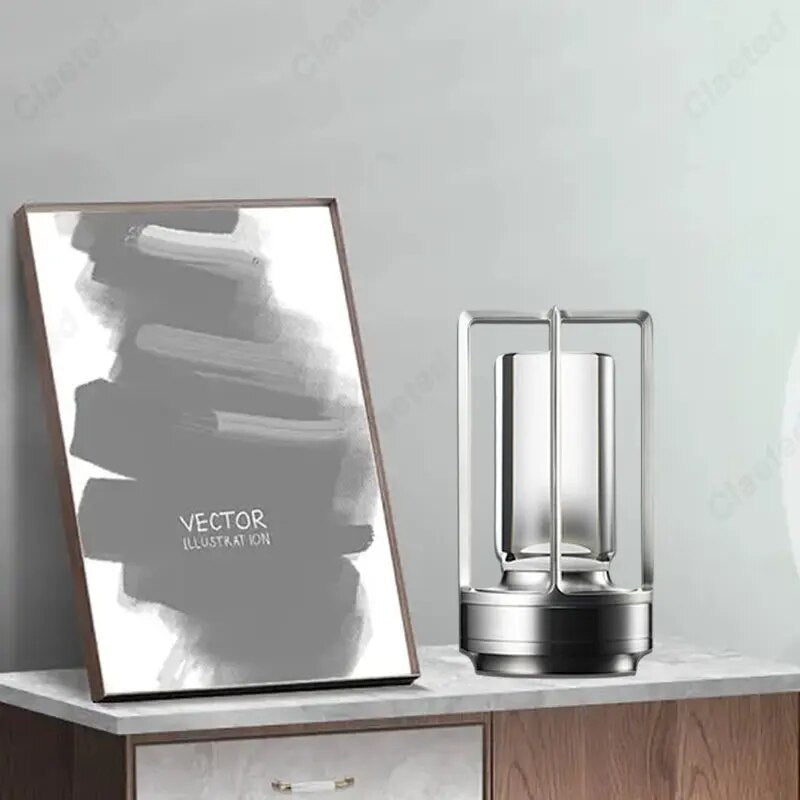 Cordless lantern lamp with adjustable brightness on a patio table for outdoor ambiance