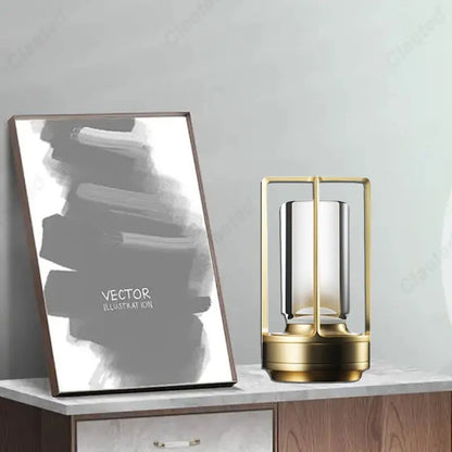 Cordless lantern lamp with adjustable brightness on a patio table for outdoor ambiance