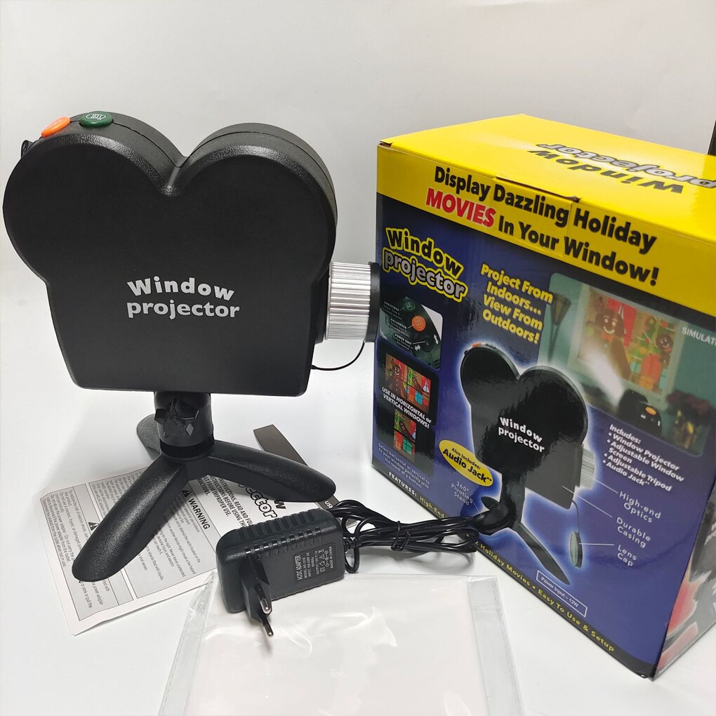 Halloween horror shadow projector casting eerie ghostly shadows on a wall for a haunted house party