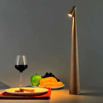 Cordless reading lamp with downward shade on a nightstand, ideal for apartment dwellers and students