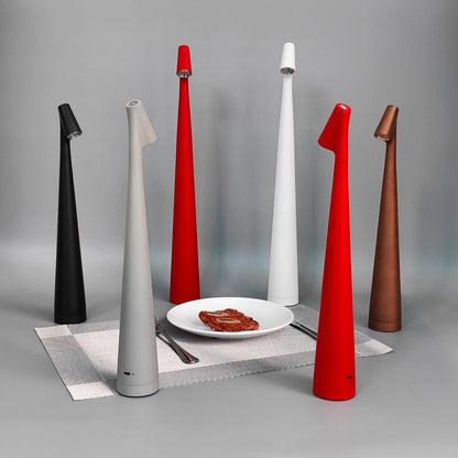 Cordless reading lamp with downward shade on a nightstand, ideal for apartment dwellers and students