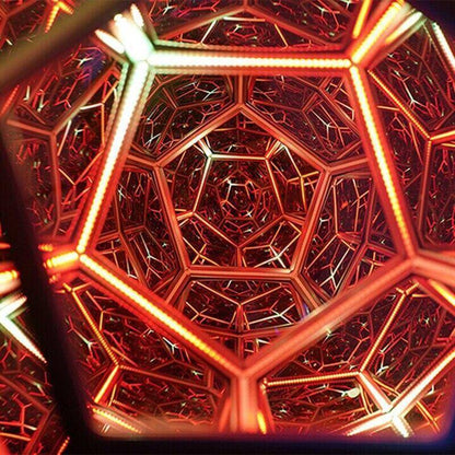 3D infinity mirror dodecahedron night light with rainbow LED glow on a wall, creating a photo backdrop for parties