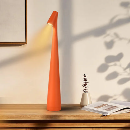 Cordless touch lamp with aluminum body and downward shade, perfect for apartment dwellers