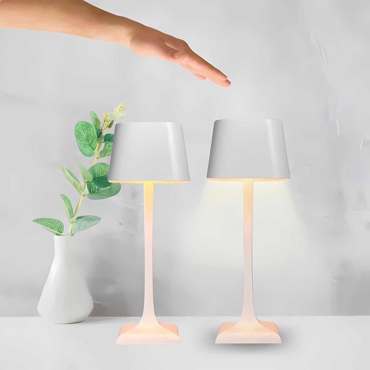 Cordless table lamp with touch controls on a bedside table, portable for any room
