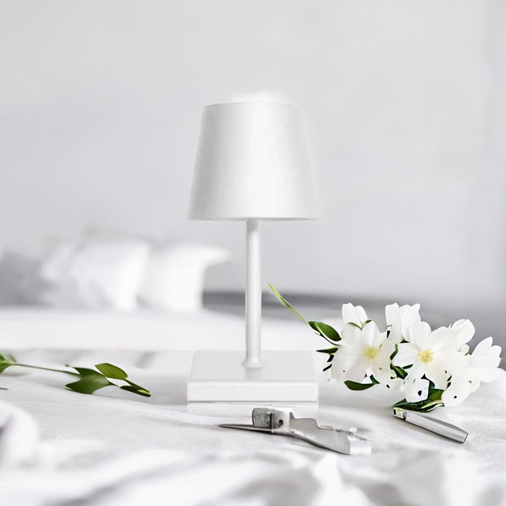 Cordless table lamp with aluminum body and touch controls, suitable for outdoor and bathroom use
