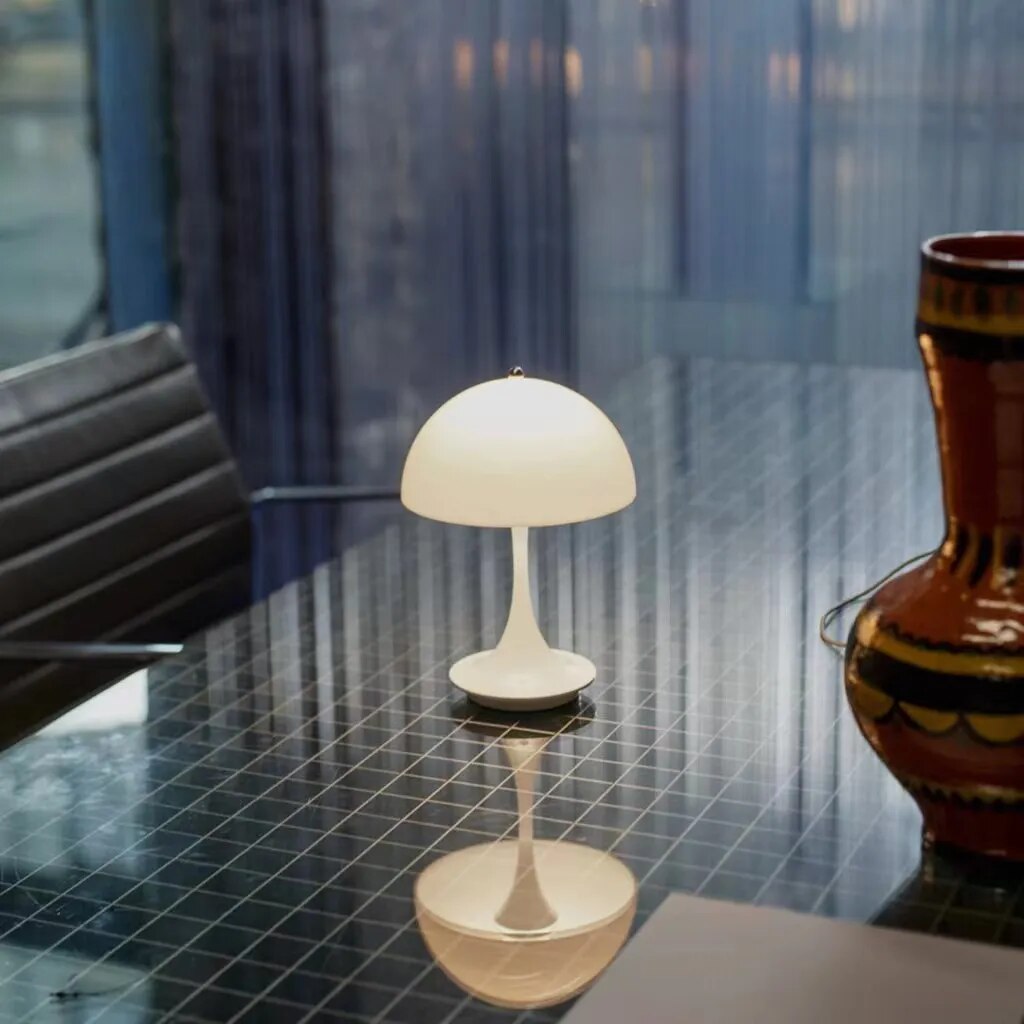 Cordless touch dimmable LED table lamp with white frame and polished chrome finish for modern apartments
