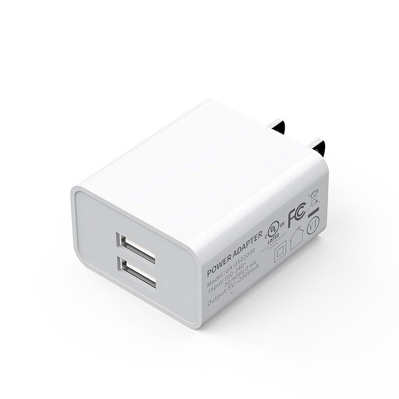 Compact dual-port USB wall charger for travelers