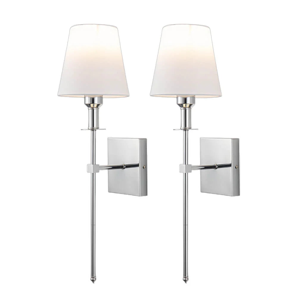 Rechargeable wireless wall light with metal accents, mounted on a wall in a living room, for renters
