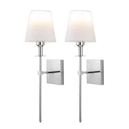 Rechargeable wireless wall light with metal accents, mounted on a wall in a living room, for renters