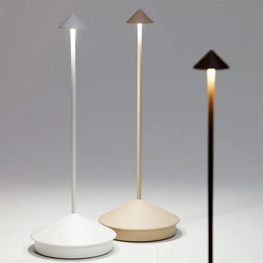 Cordless LED table lamp on a patio table for outdoor ambiance