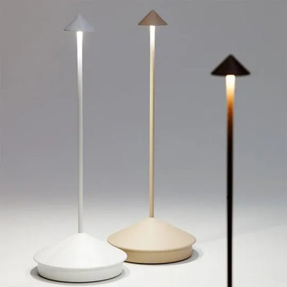 Cordless LED table lamp on a patio table for outdoor ambiance