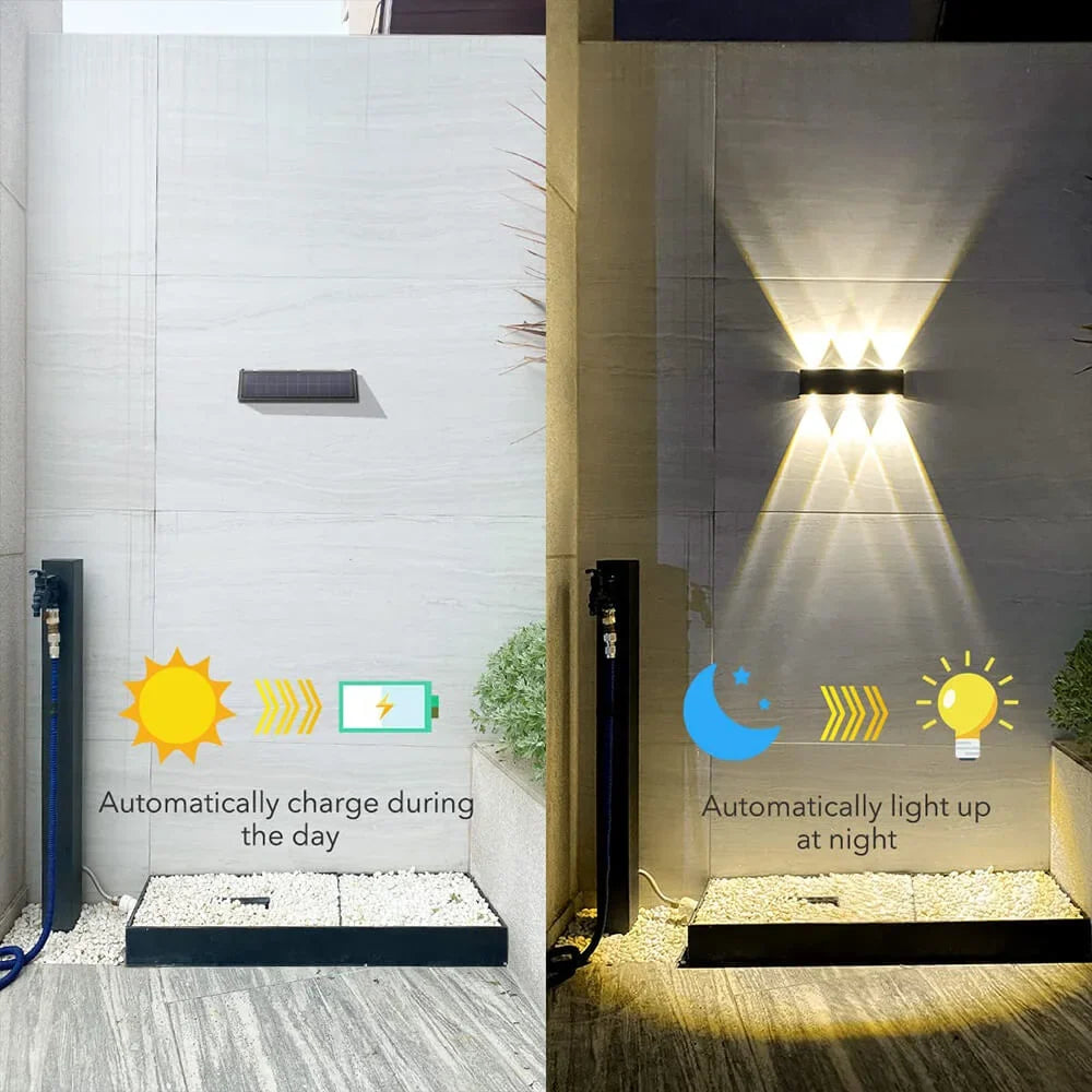 Black aluminum solar up down wall light mounted on exterior wall, no wires visible