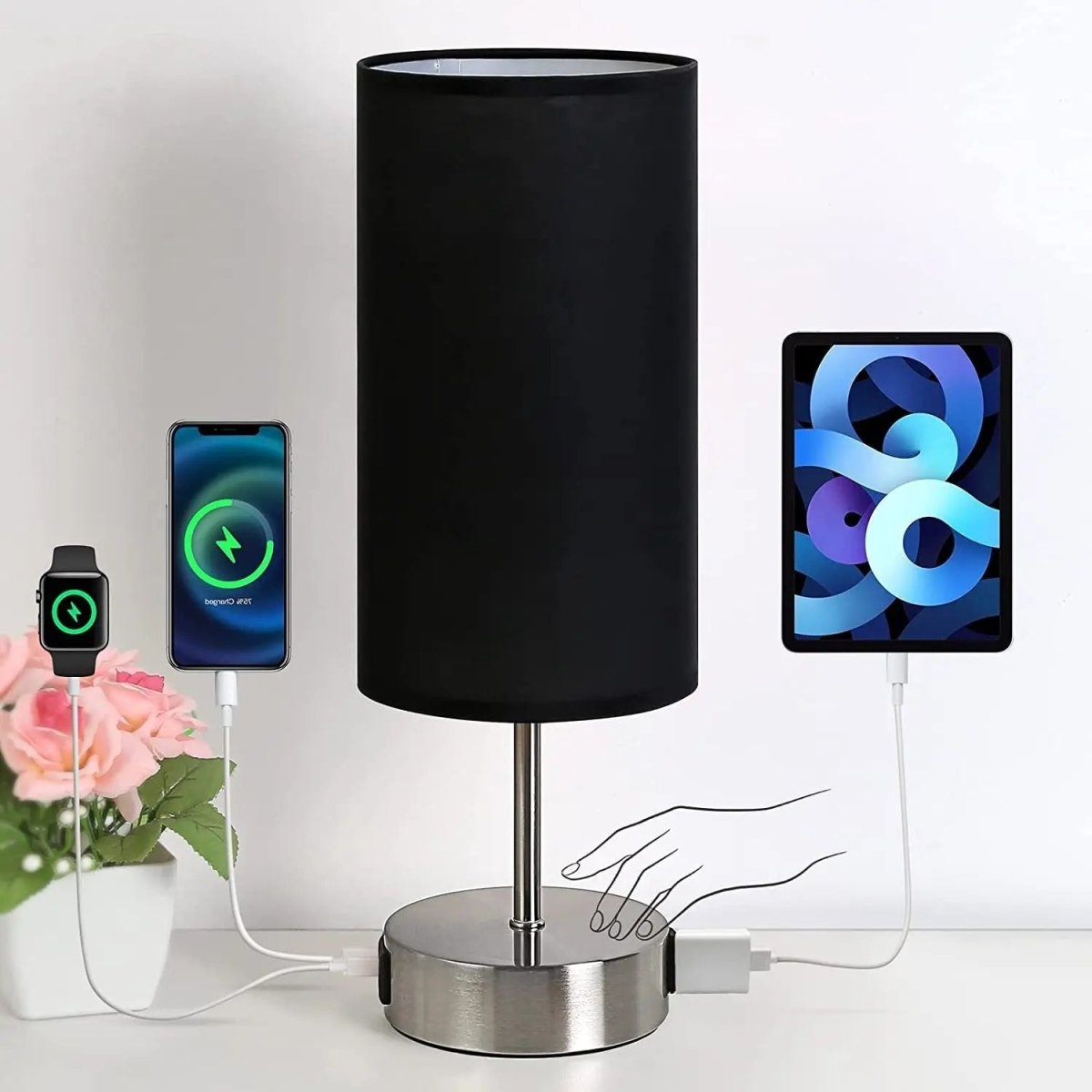 Touch table lamp with USB charging ports and AC outlet on a bedroom nightstand