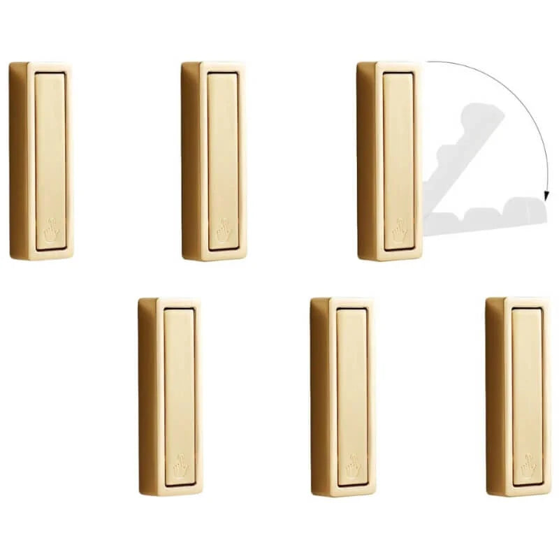 Folding coat hook folded flat against wall in small space