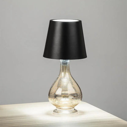 Rechargeable wine bottle light with color-changing LED on a black bottle for home entertaining