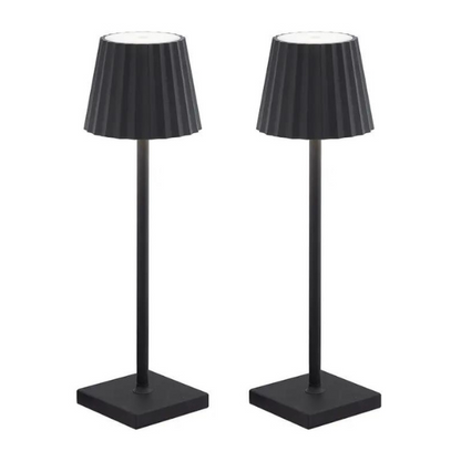 Cordless waterproof LED table lamp on a patio table for outdoor entertaining