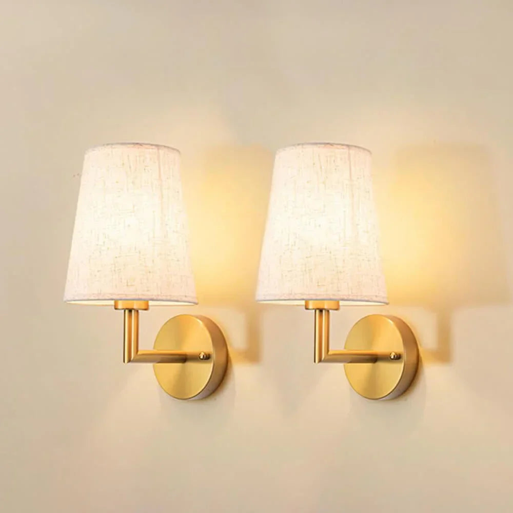 Cordless fabric wall sconce with metal accents for renters