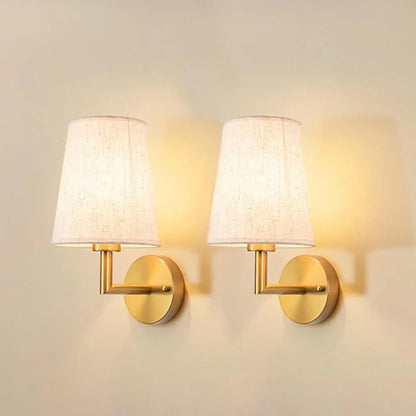Cordless fabric wall sconce with metal accents for renters