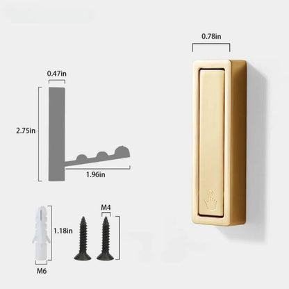 Folding coat hook folded flat against wall in small space